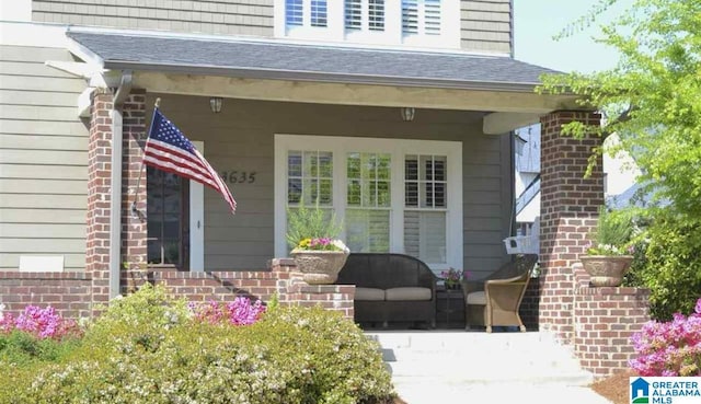 entrance to property featuring a porch