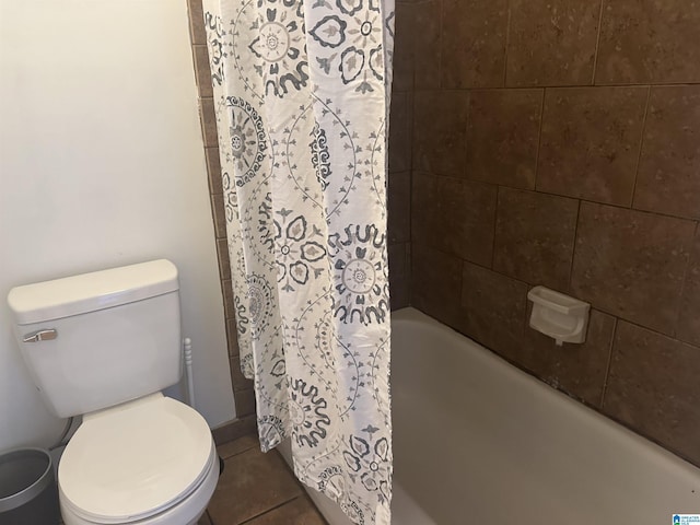 bathroom featuring tile patterned floors and toilet