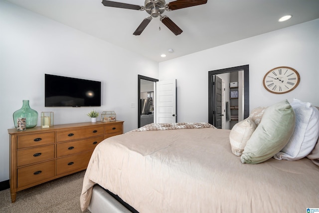 bedroom featuring ceiling fan and light colored carpet