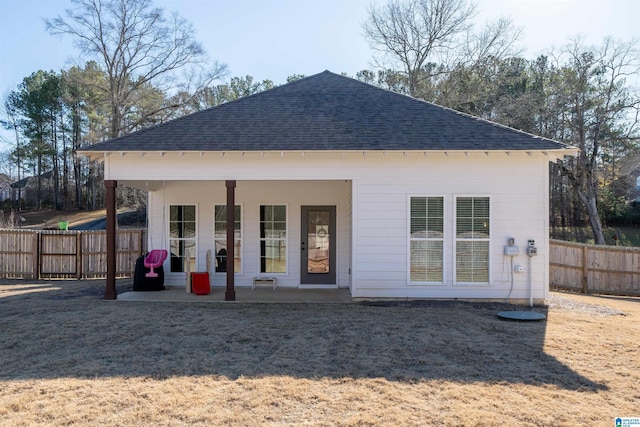 rear view of house featuring a patio