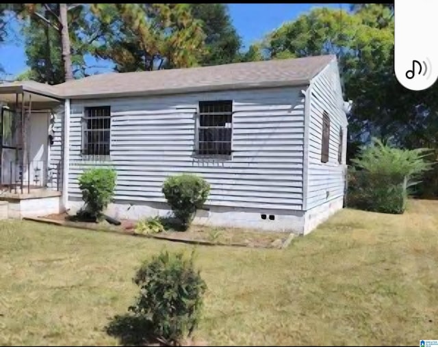 exterior space with a yard