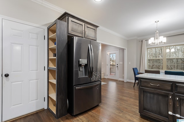 kitchen featuring dark brown cabinetry, dark wood-style flooring, stainless steel refrigerator with ice dispenser, and ornamental molding