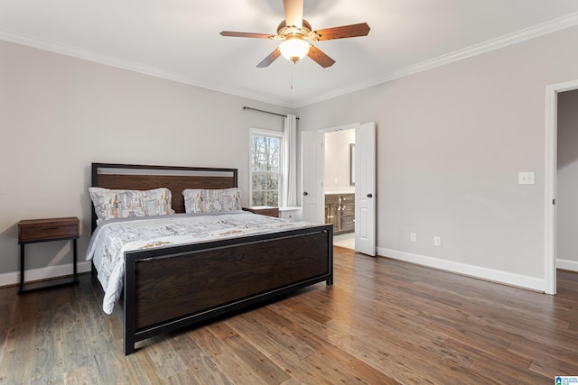 bedroom featuring ornamental molding, baseboards, and wood finished floors