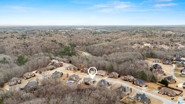 drone / aerial view with a view of trees