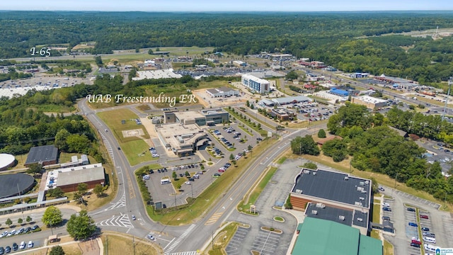 bird's eye view featuring a forest view