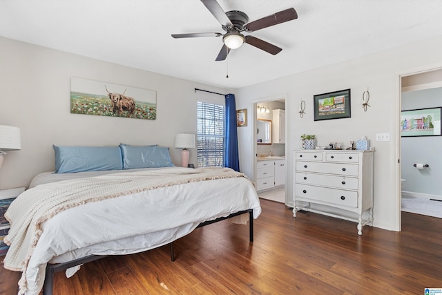 bedroom featuring ensuite bathroom, ceiling fan, and dark wood-type flooring