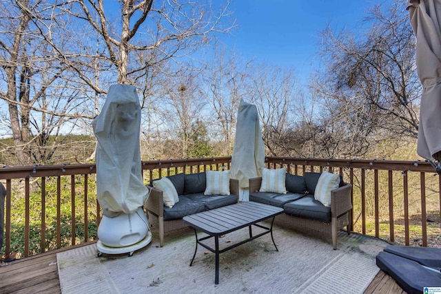 wooden deck featuring an outdoor living space