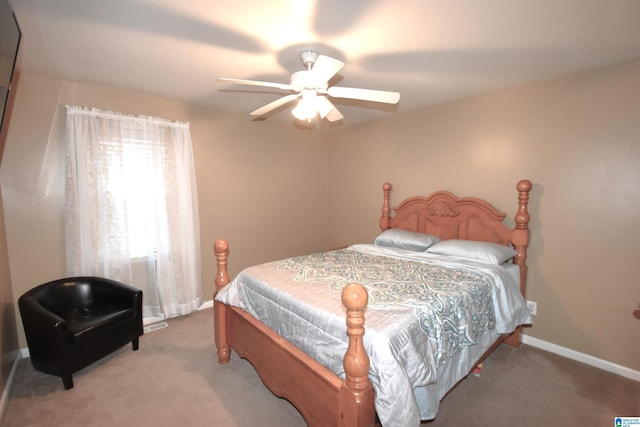 bedroom featuring ceiling fan and carpet floors