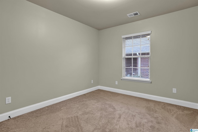 view of carpeted spare room