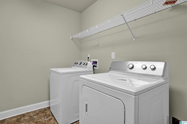 laundry area with washing machine and dryer