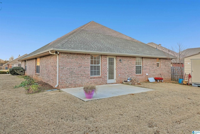 back of property with a patio