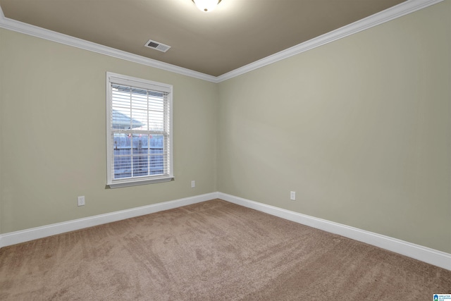 carpeted spare room with ornamental molding