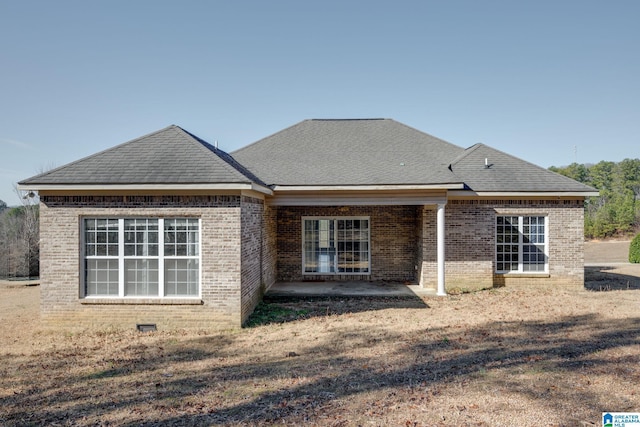 back of property featuring a patio