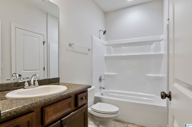 full bathroom featuring toilet, tile patterned floors, bathtub / shower combination, and vanity