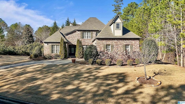 view of front of home with a front lawn