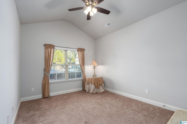 unfurnished room featuring carpet flooring, ceiling fan, and lofted ceiling