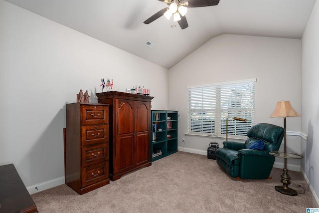 sitting room with light colored carpet, ceiling fan, and lofted ceiling