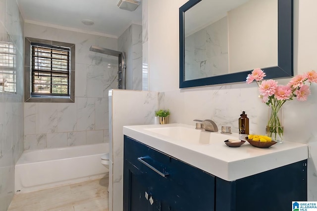 bathroom featuring decorative backsplash, vanity, and toilet