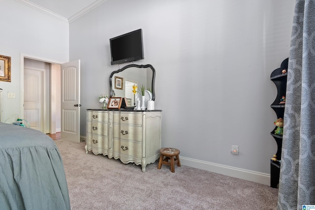 carpeted bedroom with crown molding