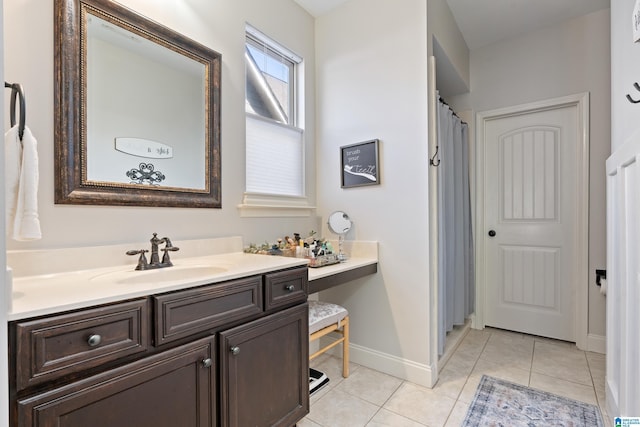 bathroom featuring tile patterned floors and vanity