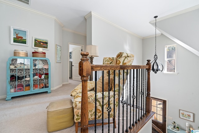 corridor featuring carpet flooring, crown molding, and a chandelier