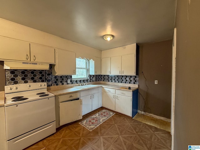 kitchen with sink, white cabinets, dark parquet floors, and white electric stove