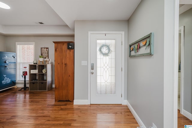 foyer entrance featuring hardwood / wood-style floors