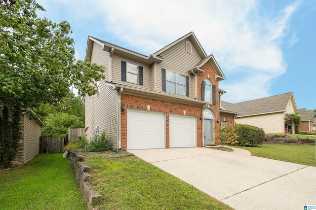 view of front of house featuring a garage and a front yard