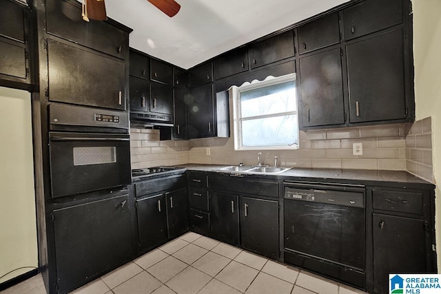 kitchen featuring light tile patterned floors, sink, backsplash, and black appliances