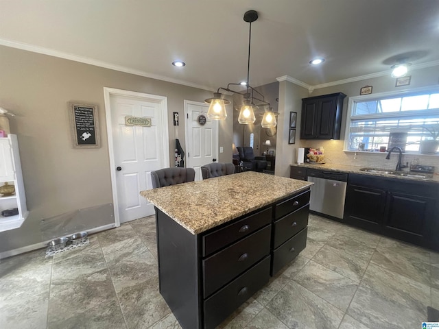 kitchen featuring light stone countertops, dishwasher, sink, a center island, and hanging light fixtures