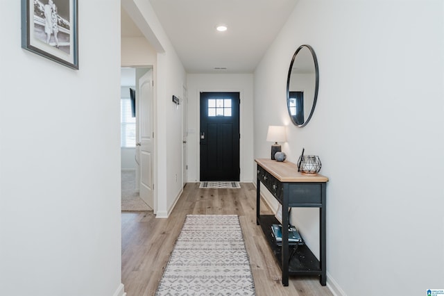 doorway featuring light wood-type flooring