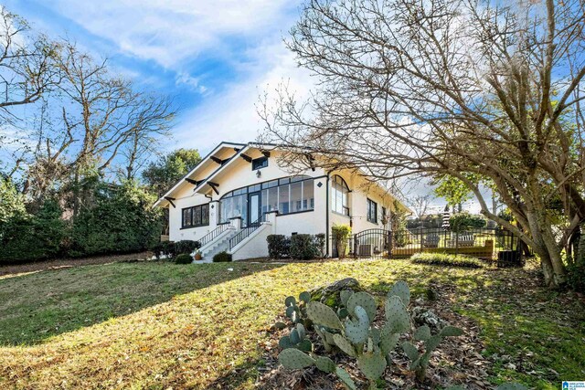 view of front of home with a front yard