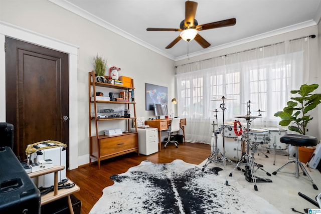 office space featuring ceiling fan, dark hardwood / wood-style floors, and crown molding