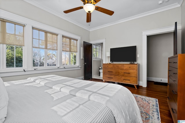 bedroom featuring ceiling fan, ornamental molding, dark wood-type flooring, and multiple windows