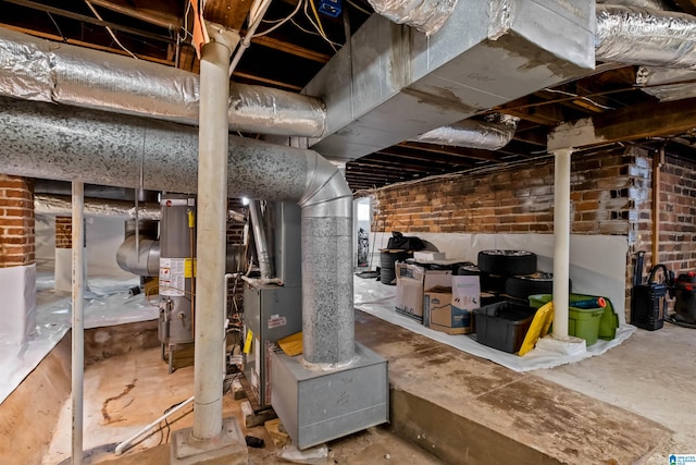 basement with brick wall