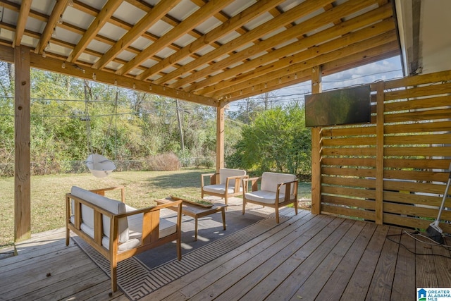 wooden deck with outdoor lounge area and a lawn