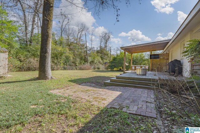 view of yard with a deck