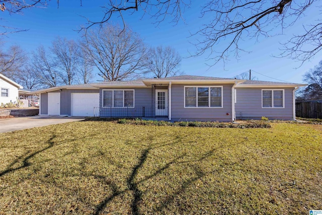 ranch-style house with a garage and a front lawn