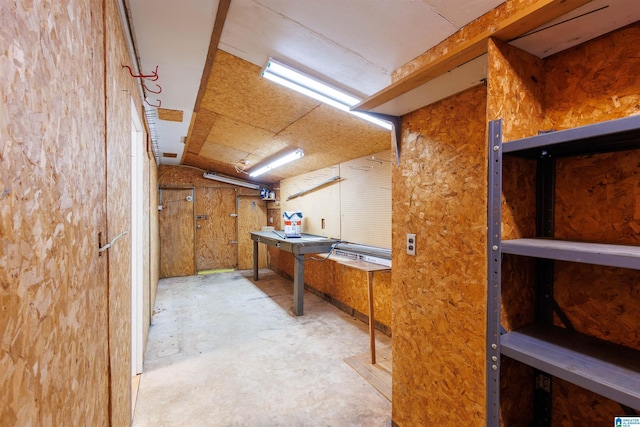 basement with a workshop area