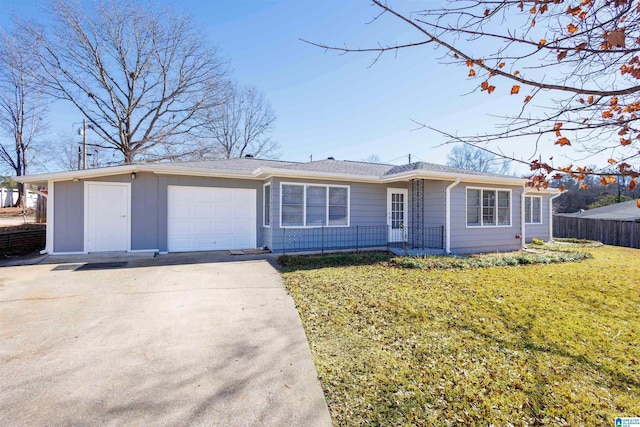 single story home with a garage and a front yard