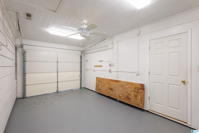 garage with ceiling fan and wooden ceiling