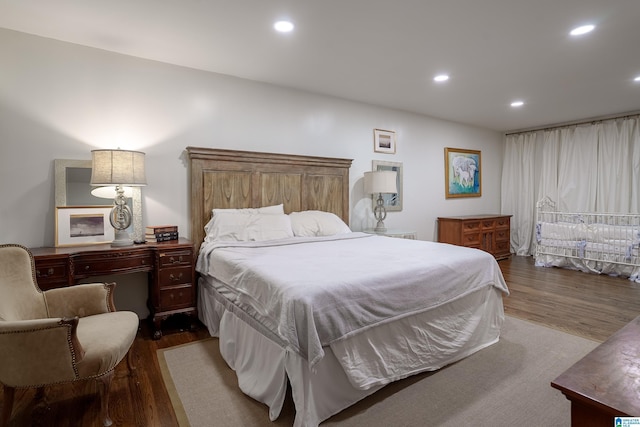 bedroom featuring dark hardwood / wood-style floors