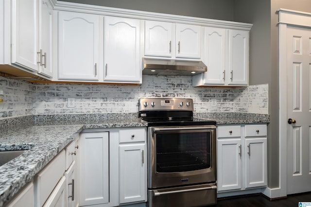 kitchen featuring white cabinetry, stainless steel electric range oven, and range hood