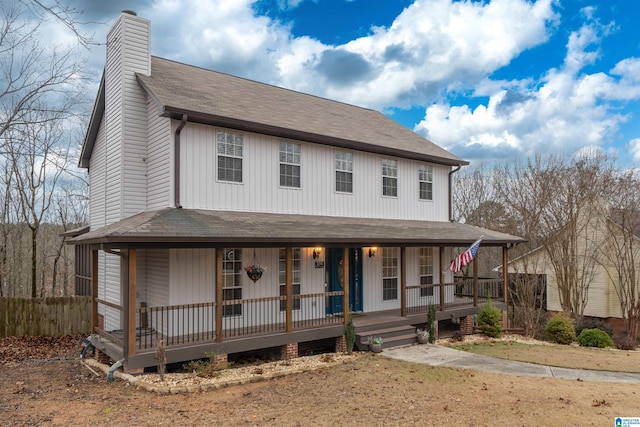 country-style home with a porch