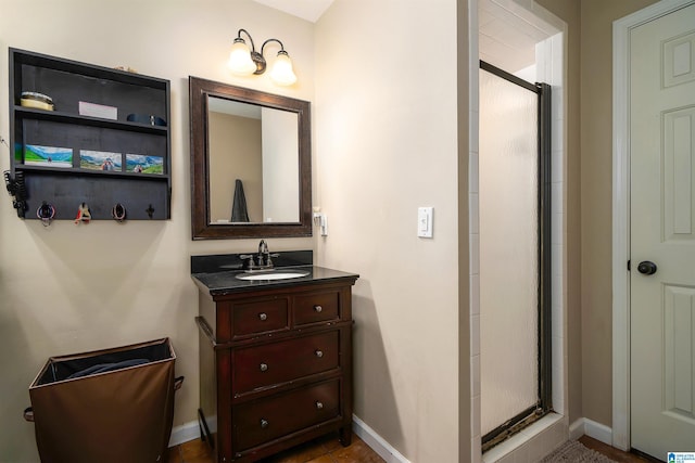 bathroom featuring vanity and walk in shower