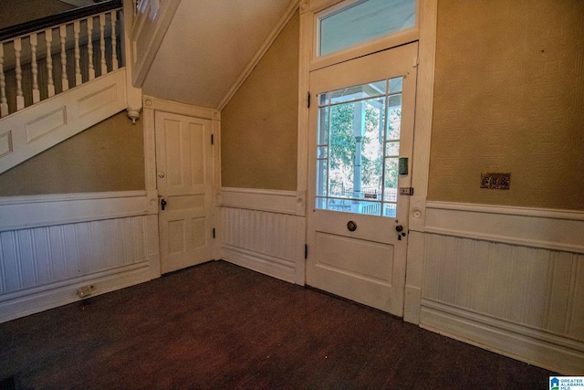 entryway with dark hardwood / wood-style floors