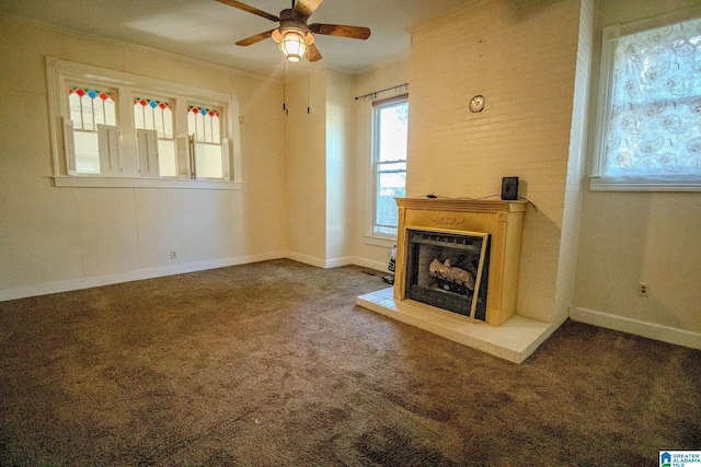 unfurnished living room with carpet flooring, ceiling fan, and ornamental molding