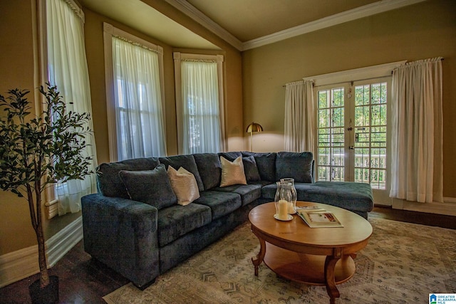 living room with crown molding, french doors, and wood finished floors