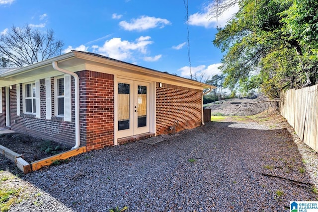 view of home's exterior featuring french doors