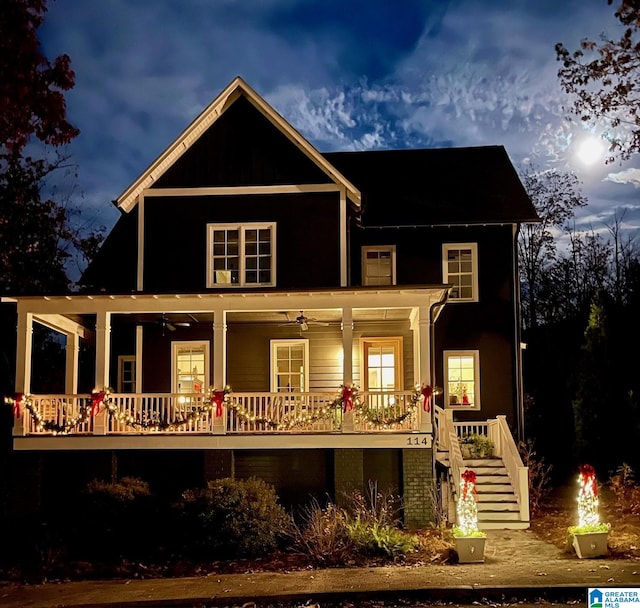 back of house with a porch and ceiling fan